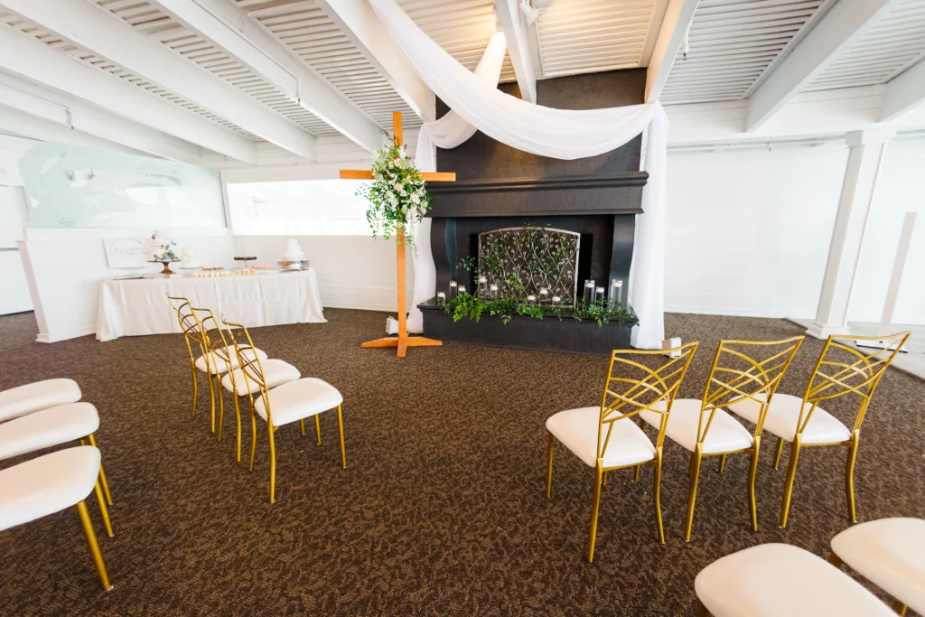 The Watertable Event Space Indoor Wedding Altar with Fireplace